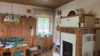 Freistehendes Wochenendhaus in Alleinlage mit herrlicher Fernsicht - Wohnzimmer/Kamin